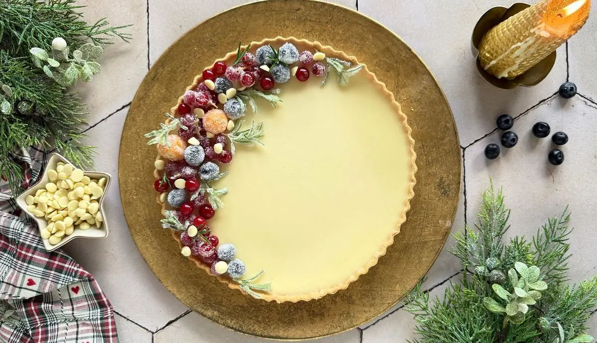 طرز تهیه دسر بیسکوییت و انار با کرم لوتوس برای شب یلدا - تصویر شاخص