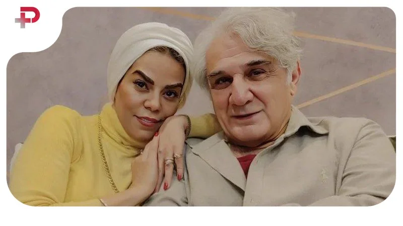 عکس| مهدی هاشمی و زن جوانش؛ همسر آقای بازیگر با پالتو قرمز جلب توجه کرد - تصویر شاخص
