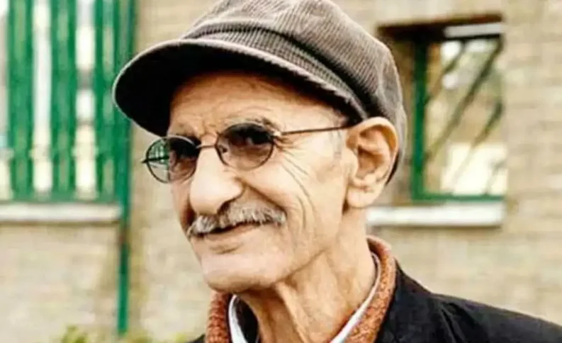 عکس| سفر به گذشته ؛ عکس نادر احمد پورمخبر کنار دستفروش تهران در سال 96! - تصویر شاخص