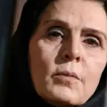 عکس آتلیه‌ای عزت الله مهرآوران و آهو خردمند در میانسالی
