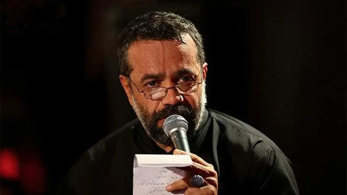 محمود کریمی در کنار پدرش در کودکی / عکس
