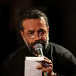 محمود کریمی در کنار پدرش در کودکی / عکس